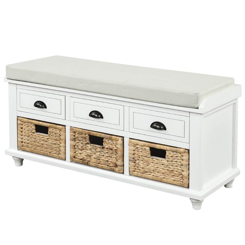 Elegant white storage bench with rattan baskets and drawers, styled in an entryway.