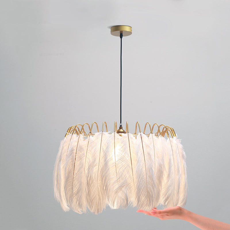 Close-up of the elegant ostrich feather LED pendant light highlighting its intricate design.