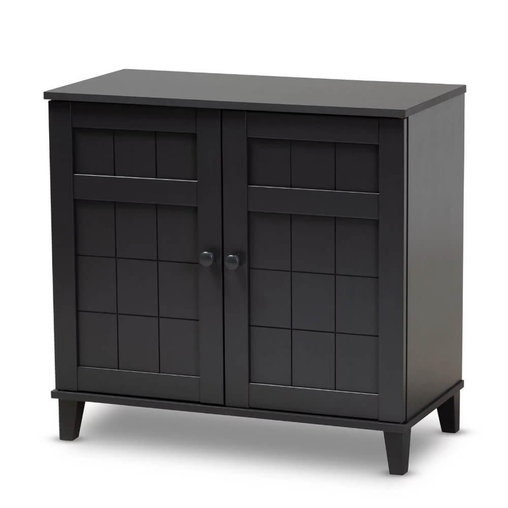 Close-up of the recessed grid pattern on the doors of the shoe cabinet.