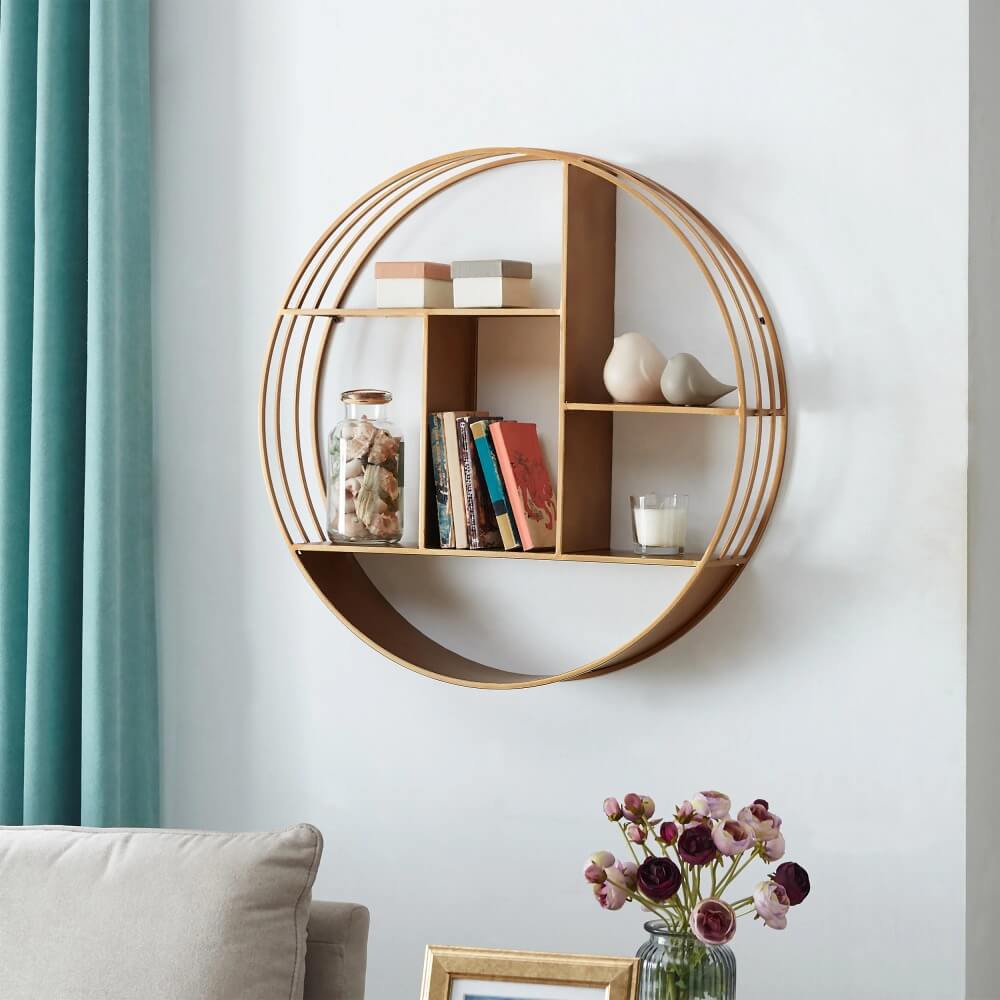 Front view of the Luxe Gold Circular Metal Wall Shelf showcasing its three levels and compartments.