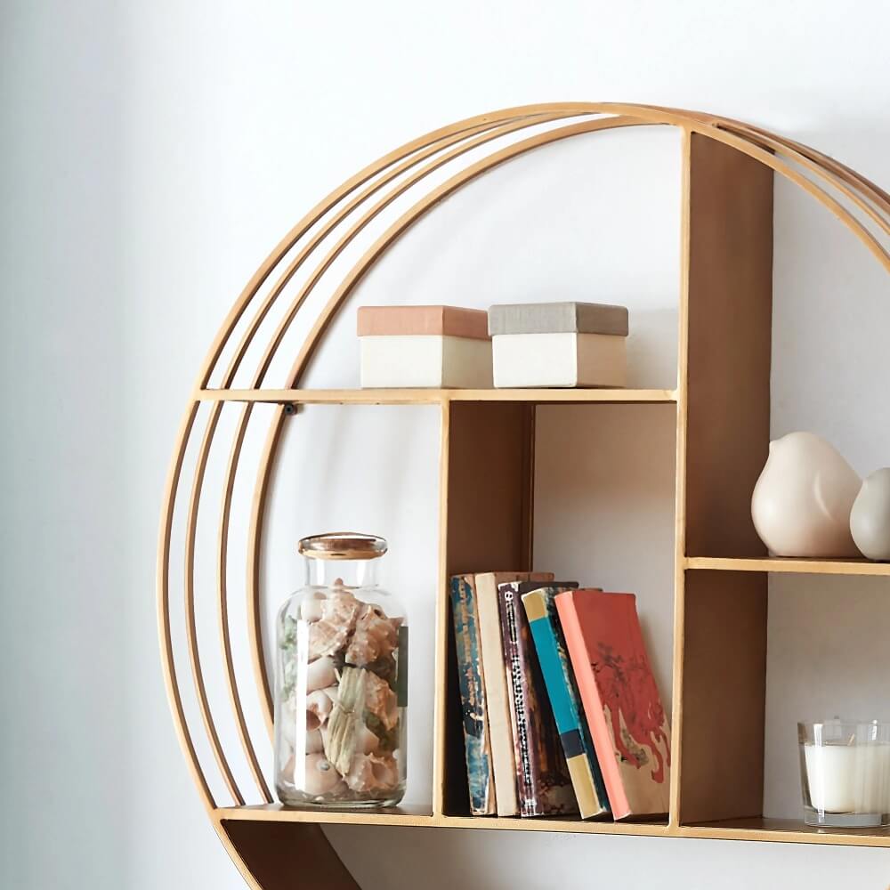 Lifestyle shot of the wall shelf in a modern living room, adorned with books and decorative items.