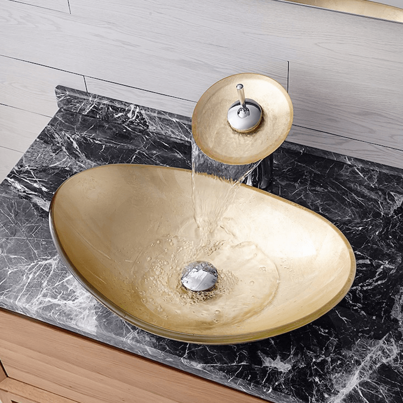A stylish bathroom setup featuring the gold ingot tempered glass sink, highlighting its contemporary appeal.