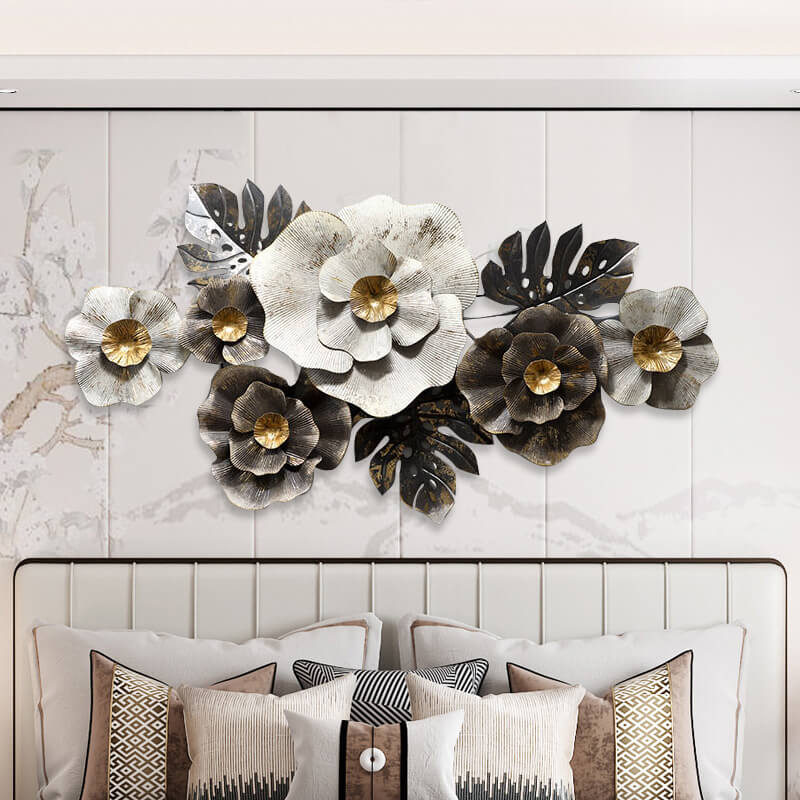 Installation of Nordic decorative iron wall hangings on a blank wall, adding character to the space.