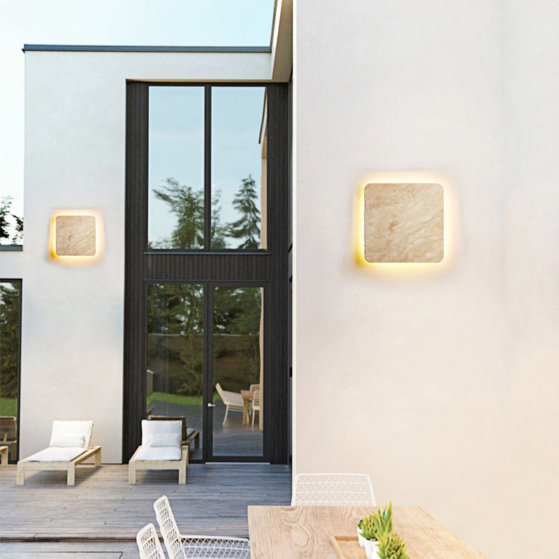 Modern waterproof LED wall lamp showcasing light dispersion in a living room