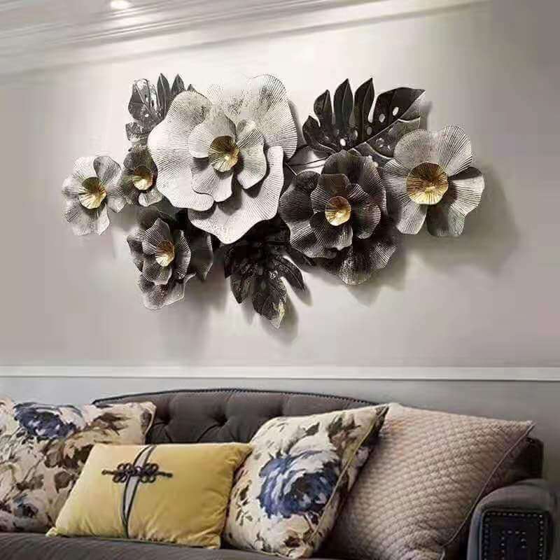Side view of Nordic decorative iron wall hangings showcasing floral design in a cozy living room.