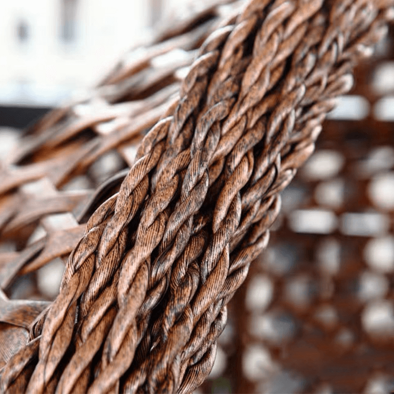 close-up of the rattan weave on the swing chair showcasing its durability