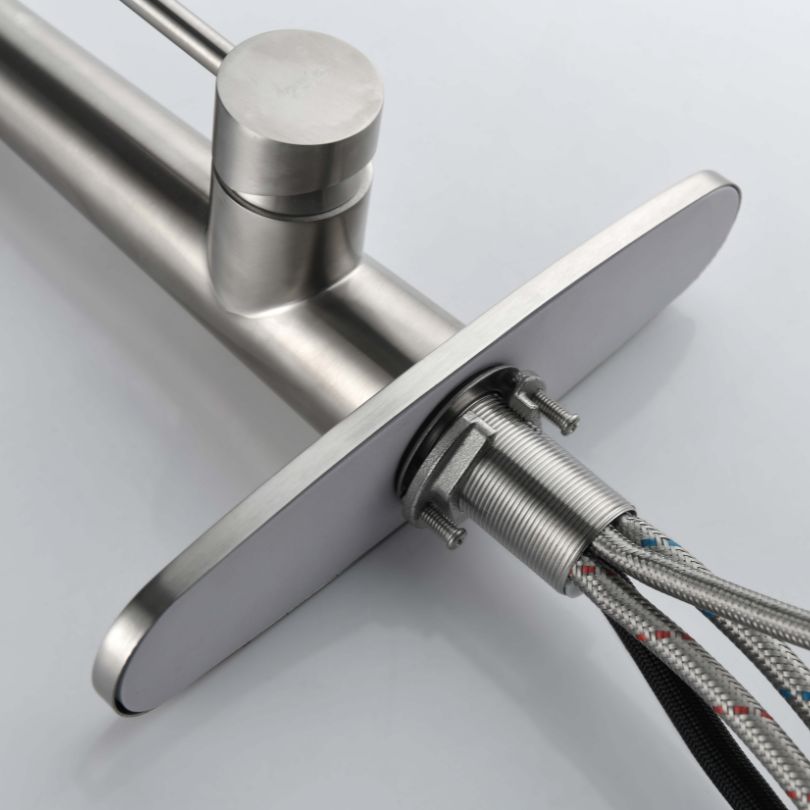 View of the high arc single handle kitchen faucet installed over a kitchen sink, demonstrating its functionality.