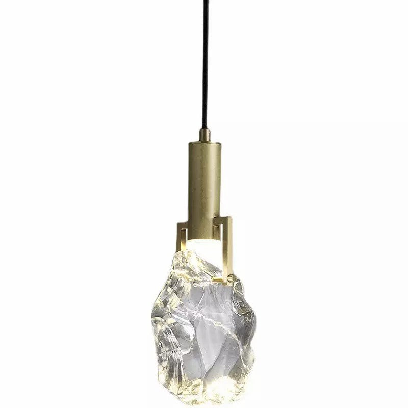 Elegant crystal pendant light showcasing its unique design from a side angle.