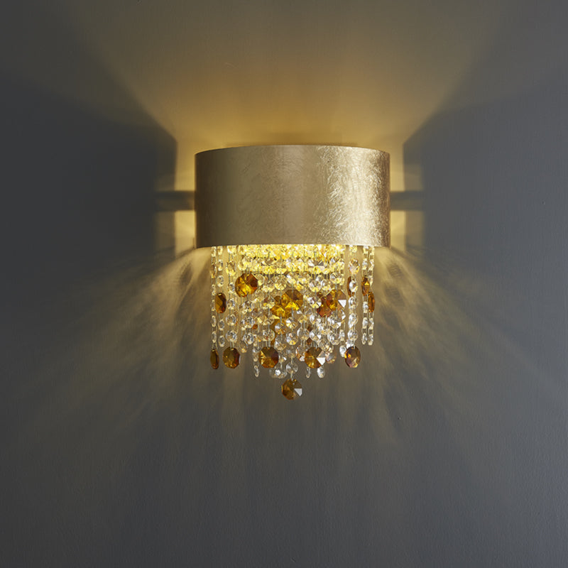 Stylish crystal lamp for home decor, highlighting its shimmering gold finish and teardrop shapes.