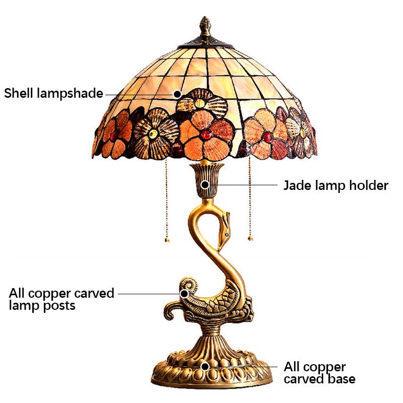 Elegant Swan Brass Table Lamp in a cozy living room setting, providing soft ambient lighting.