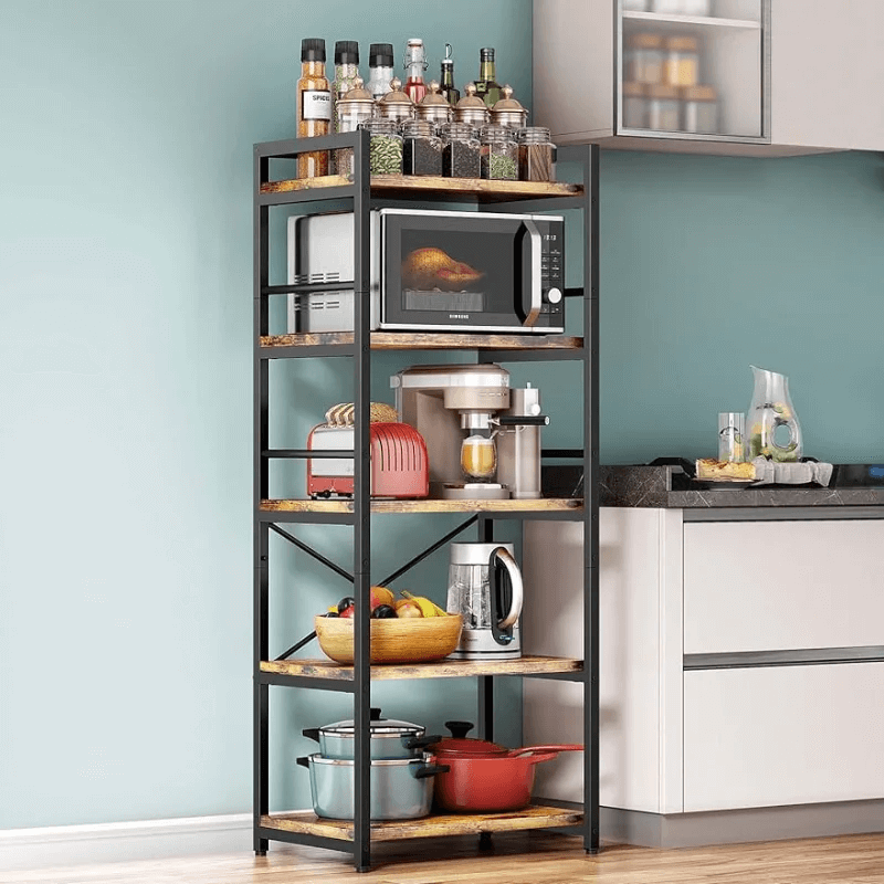 Freestanding kitchen rack with storage shelves showcasing cookware.