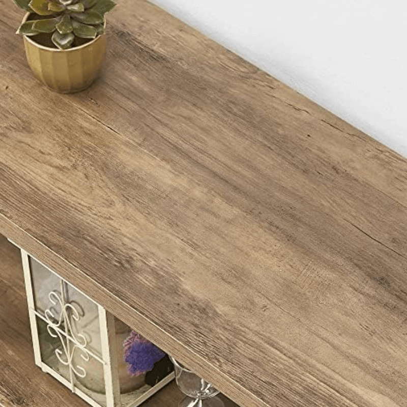 Console table placed in an entryway, highlighting its rustic charm and functionality.