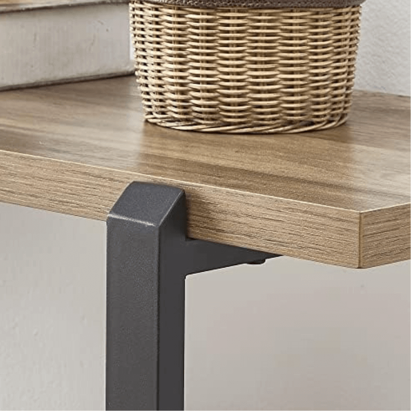 Rustic industrial console table showcasing the open shelves from a side angle.