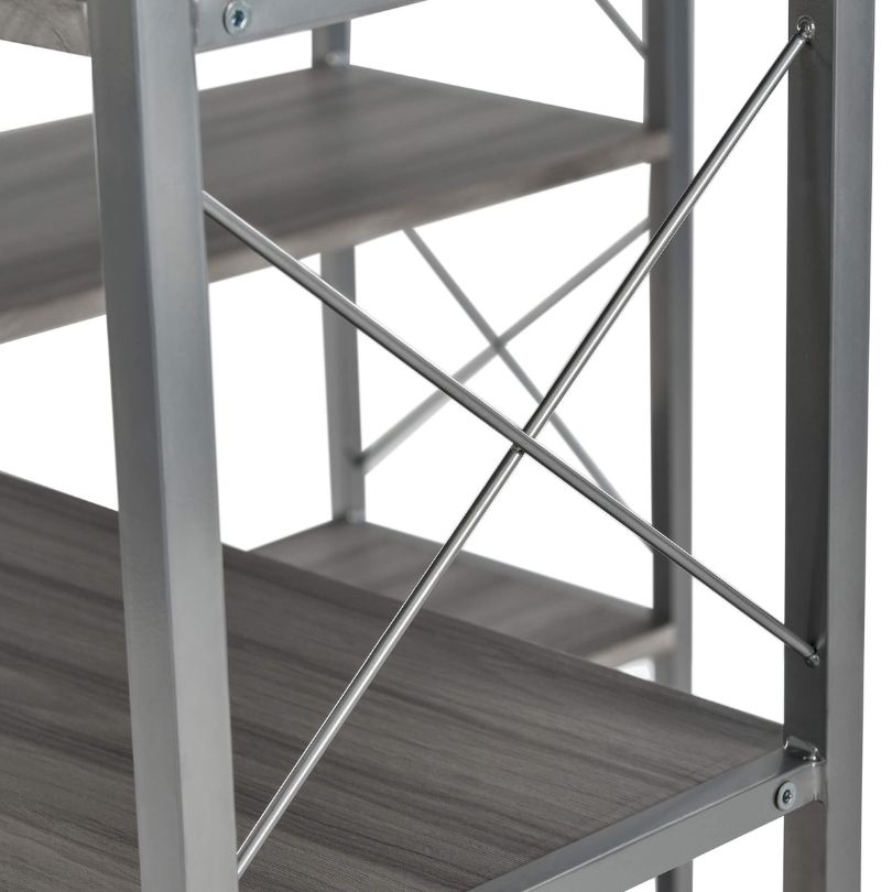 Stylish silver grey industrial corner bookcase with books and decor displayed on shelves.