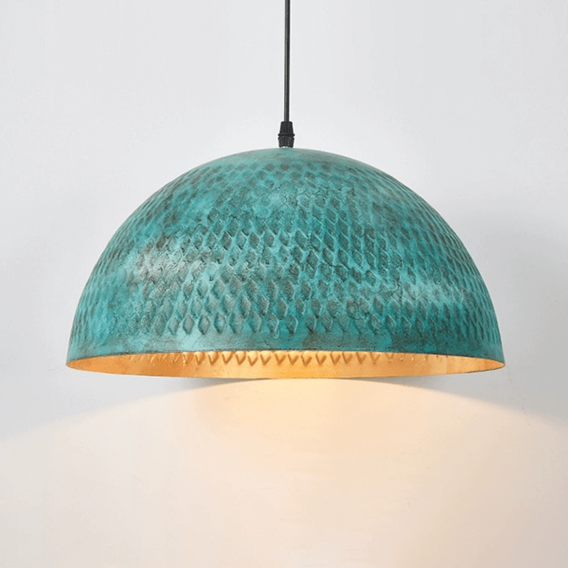 Urban Industrial Steel Pendant Light illuminating a cozy cafe setting.