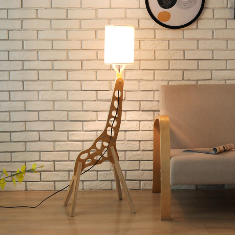 Close-up of the fabric shade of the wooden giraffe floor lamp, emphasizing its quality and craftsmanship.