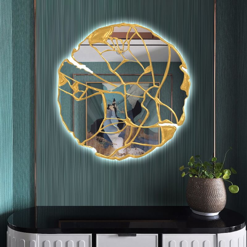 Elegant wall mirror in gold, perfect for entryway decor and adding visual interest.