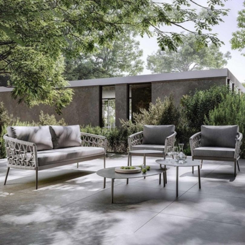 Close-up of the comfortable patio seating options featuring a double sofa.