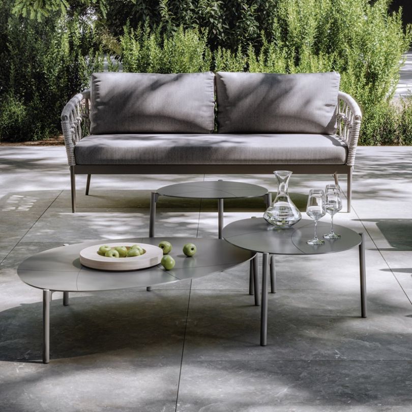 Close-up of the comfortable patio seating options featuring a double sofa.