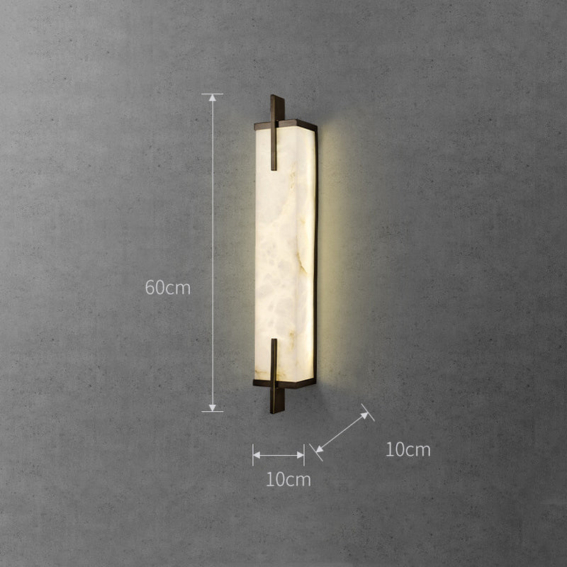 Stylish wall lamp installed on a patio, demonstrating its suitability for outdoor use.