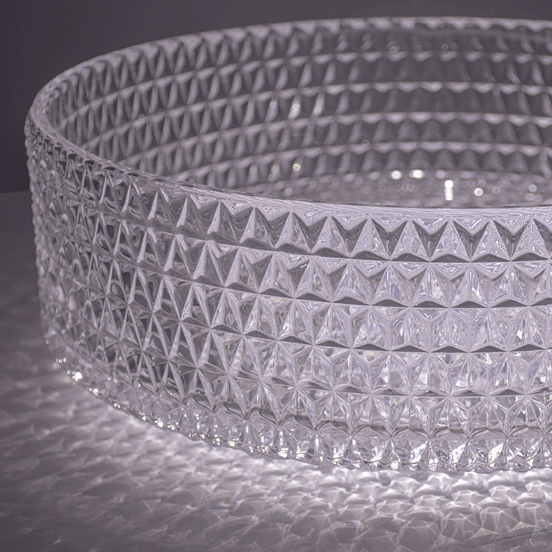 Elegant round glass vessel sink from the top, highlighting its sleek design and transparent surface.