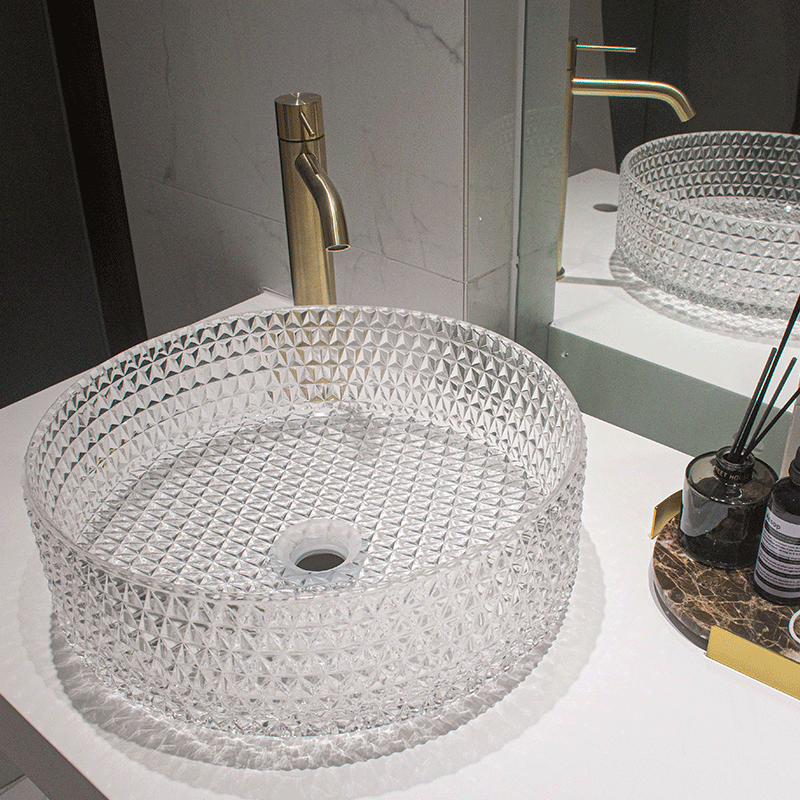 Side view of the modern glass vessel sink installed in a stylish bathroom setting.