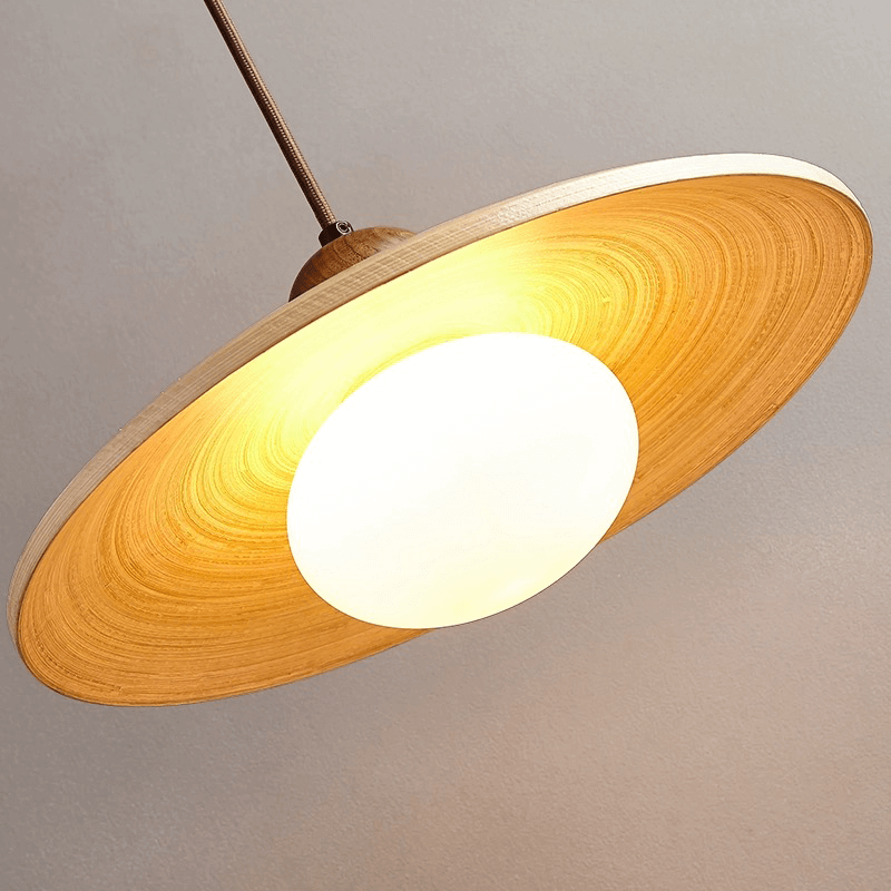 Elegant Japandi wooden shade chandelier hanging in a cozy cafe.