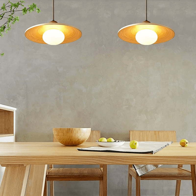 Beautifully lit Japandi wooden shade chandelier in a modern living room.