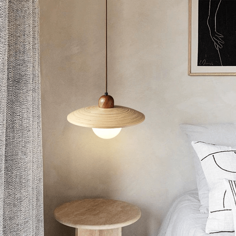 Beautifully lit Japandi wooden shade chandelier in a modern living room.