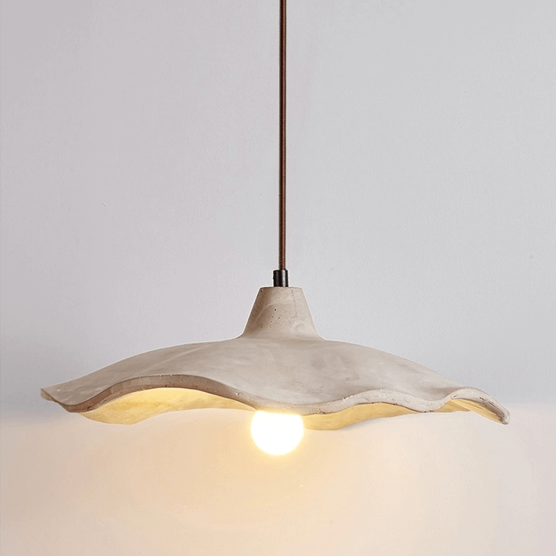 Japanese style yellow stone pendant lamp in a modern home, providing unique illumination.