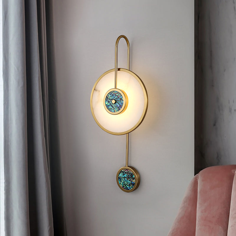 Elegant gold copper wall sconce showcasing its sophisticated design in a modern living room.