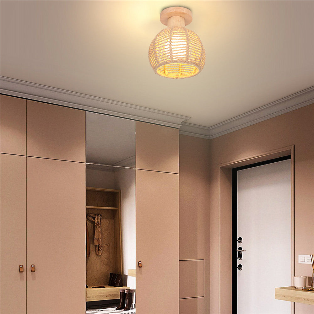 Close-up of hemp rope ball cage design in ceiling light fixture