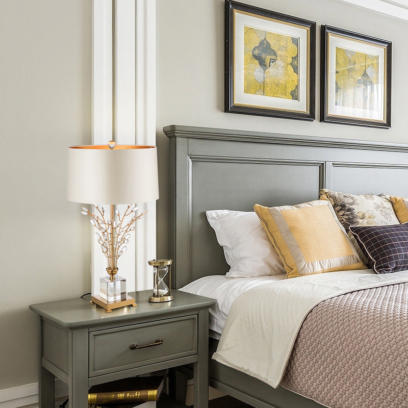 Close-up of a high-end decorative crystal lamp with fabric shade, perfect for bedrooms or study areas, highlighting the detailed craftsmanship.