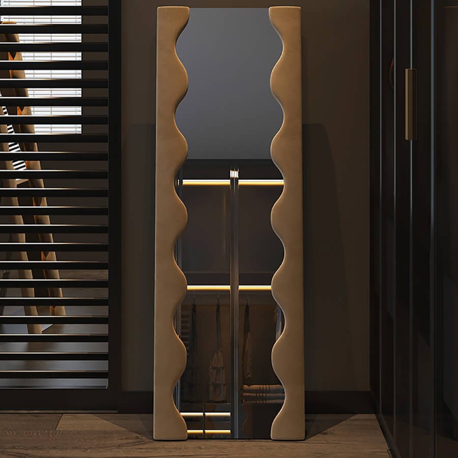 Side angle of the full body mirror highlighting its wavy frame and beige color.