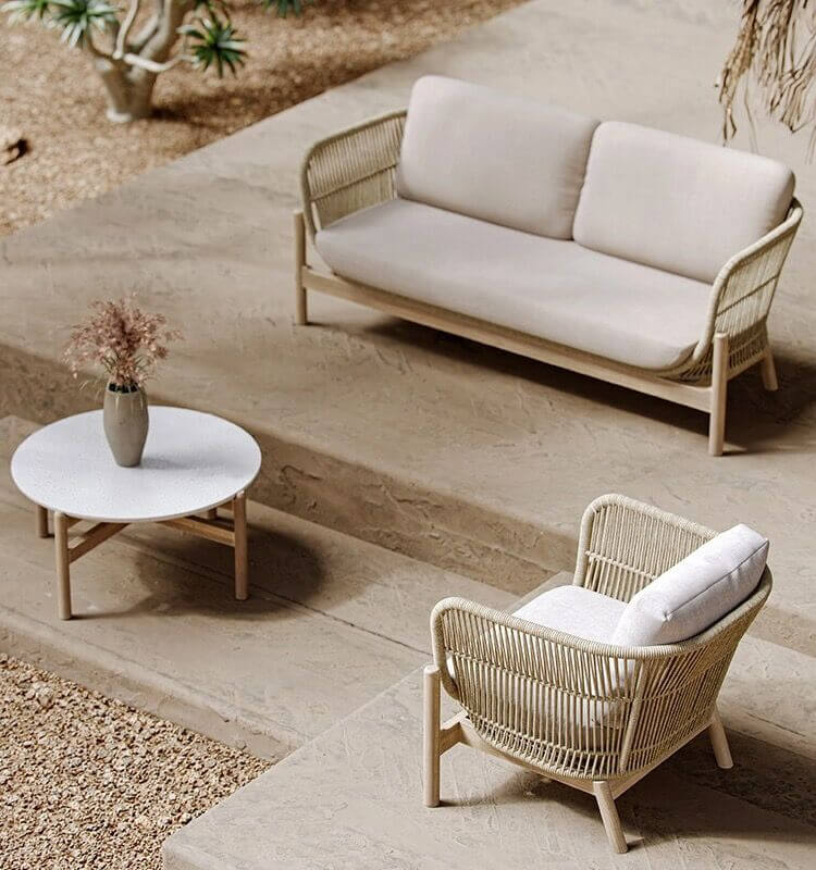 Coffee table from Kettler Luxe Outdoor Sofa Set, ideal for drinks and snacks.