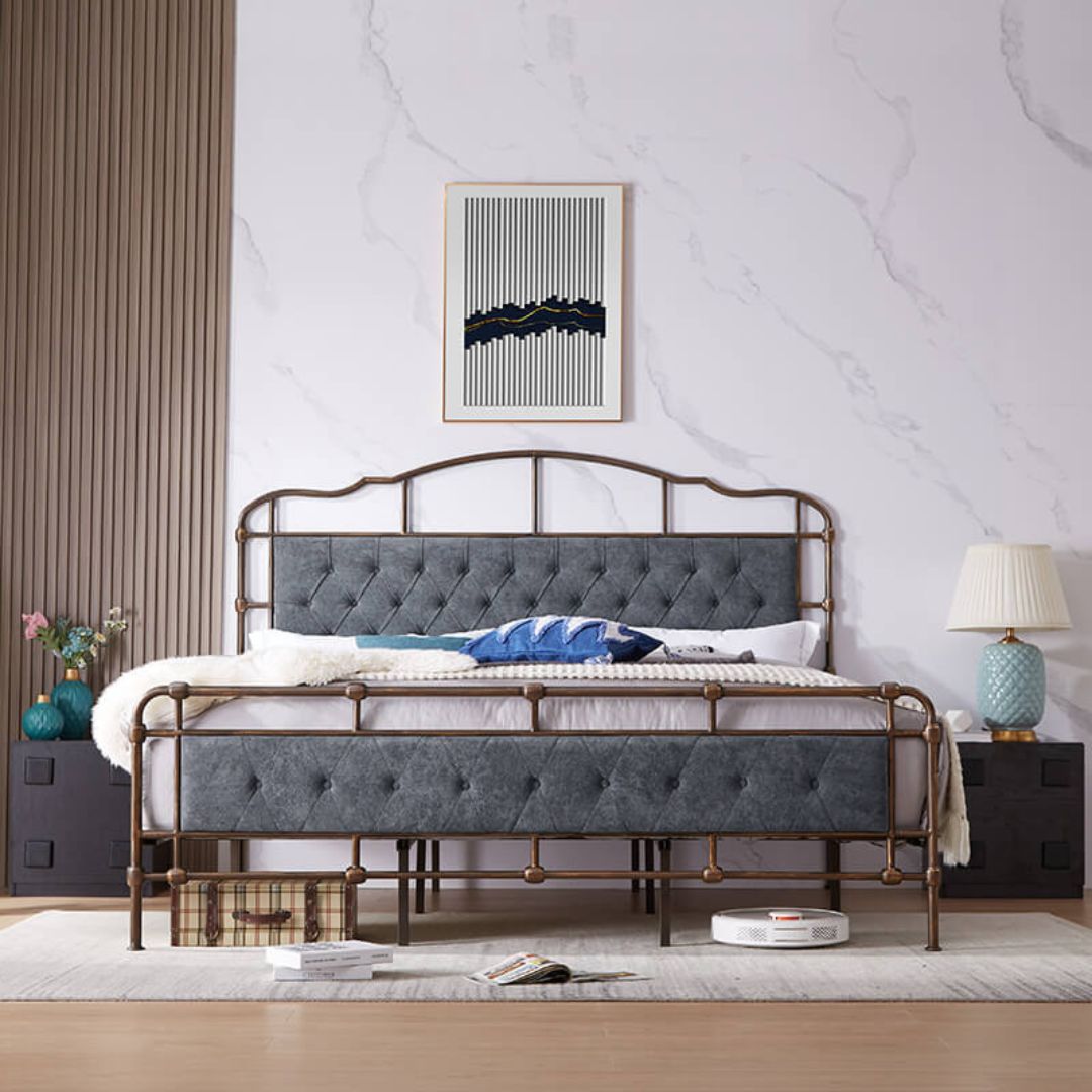 Side view of the luxurious dark grey king size metal bed frame showcasing its velvet upholstered headboard.