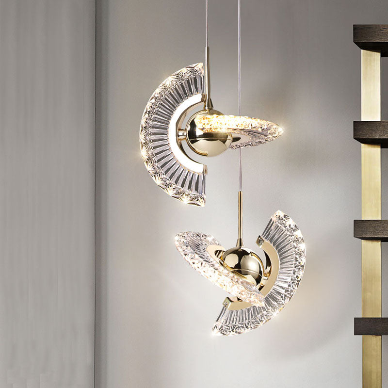 Stylish installation of an energy-saving pendant light in a contemporary living room setting.
