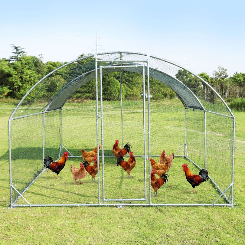 Large metal chicken coop with grey finish, designed for outdoor use.