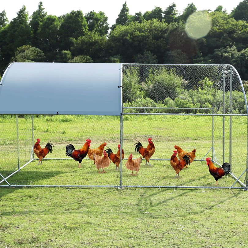 Durable metal coop featuring a waterproof cover and contemporary design.