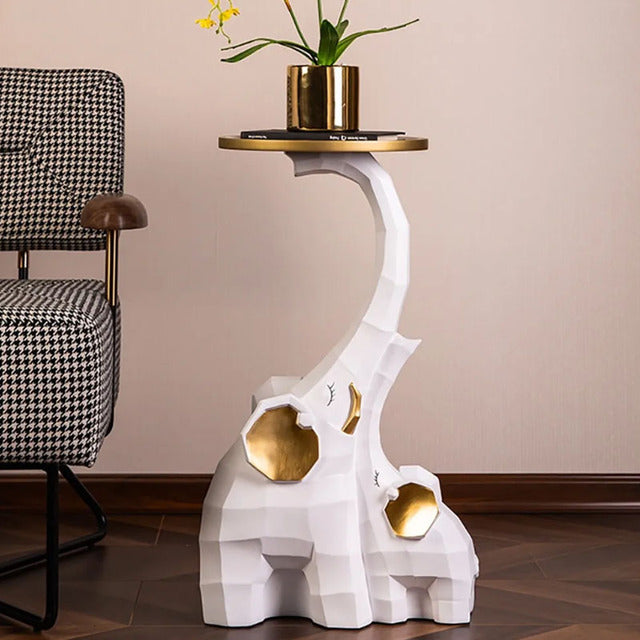 Elegant Nordic elephant sculpture with tray showcasing decorative plants.
