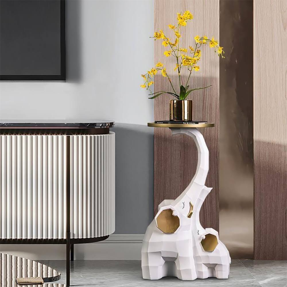 Side view of large resin elephant sculpture in a stylish living room.