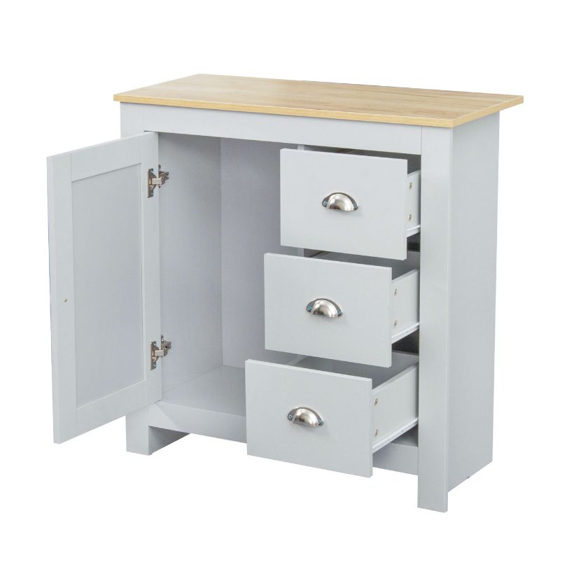 Side angle of the light gray kitchen cupboard highlighting the spacious drawers and cupboard space for kitchen organization.