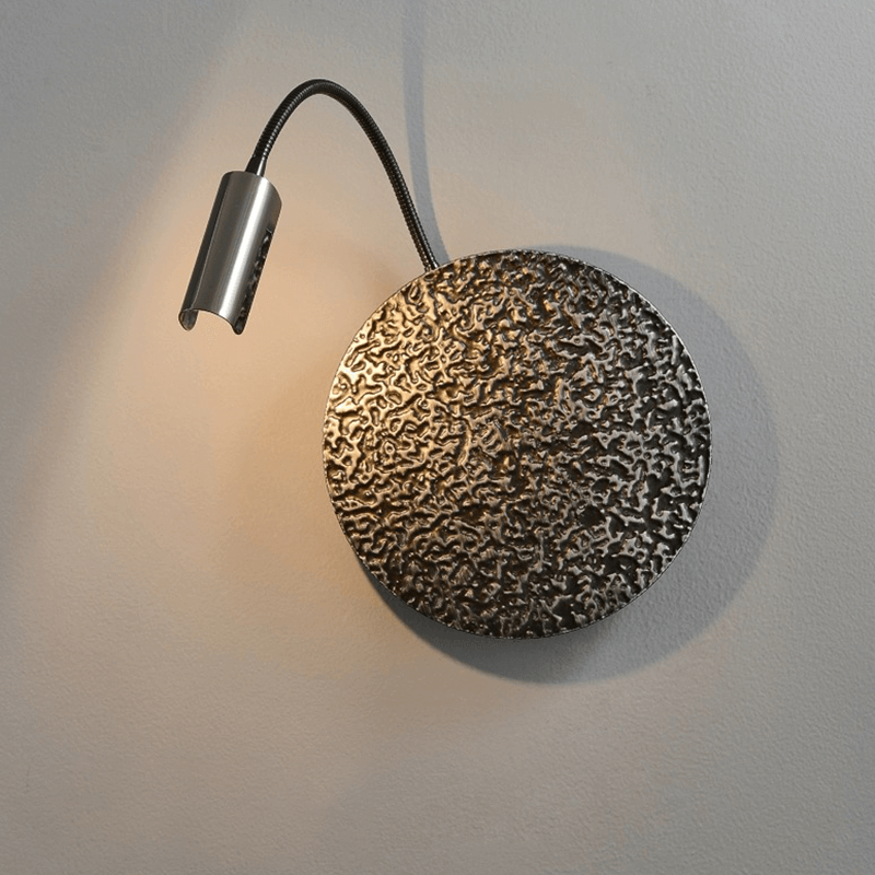 Elegant pearl black wall sconce showcasing its modern design and touch switch functionality.