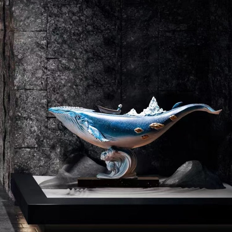 Elegant resin whale decor showcasing ocean vibes on a desk.