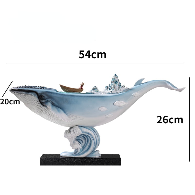 Elegant resin whale decor showcasing ocean vibes on a desk.
