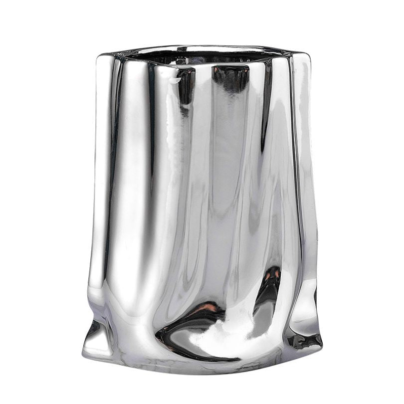 Close-up of the pleated details of the luxury ceramic vase.