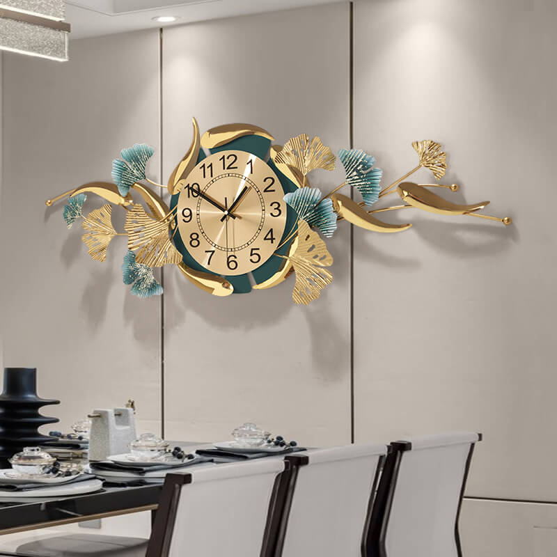 Close-up of the ginkgo leaf pattern on the wall clock, highlighting its intricate details.