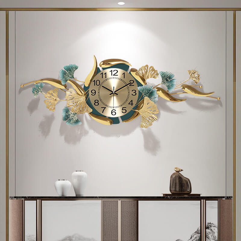 Close-up of the ginkgo leaf pattern on the wall clock, highlighting its intricate details.