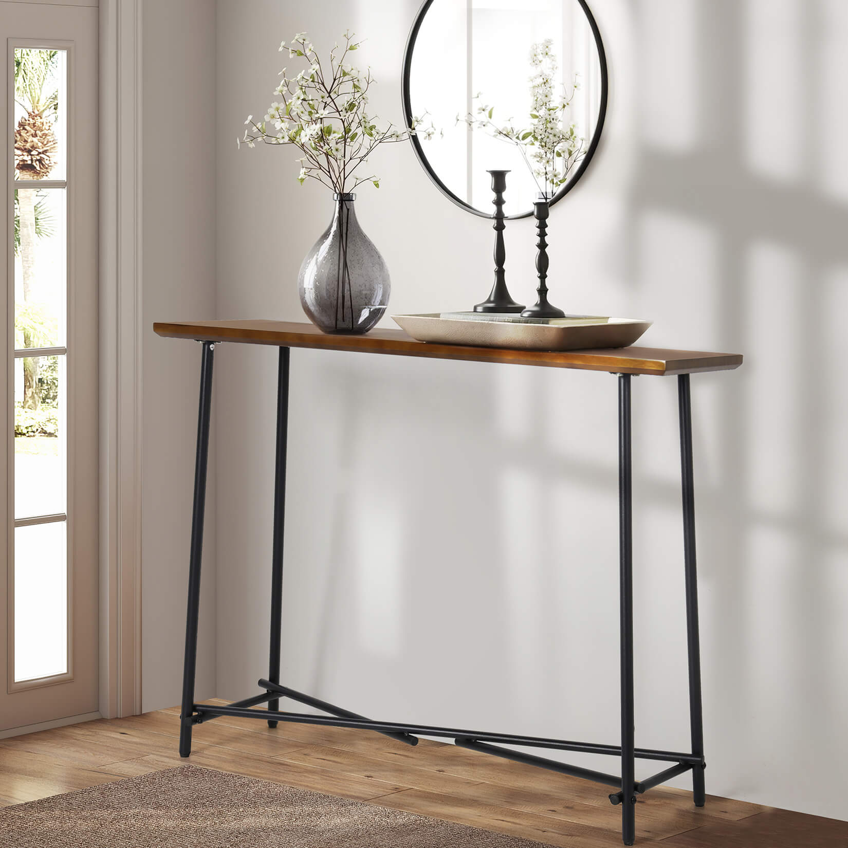 Rustic console table showing walnut brown finish and metal legs