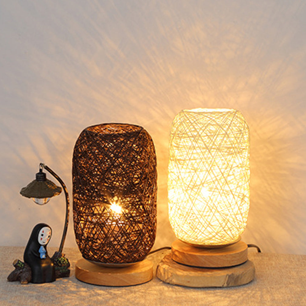 Close-up of the rattan lamp showcasing its bamboo wood base and dimmable LED feature.